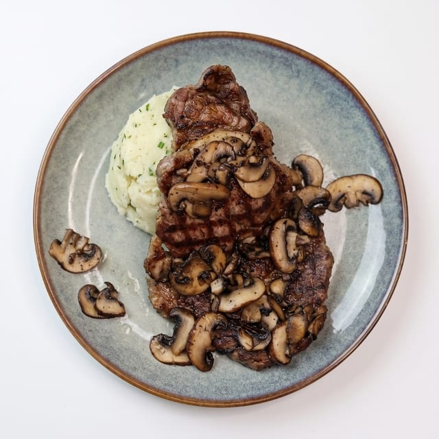 Ribeye Steak with Yuca Cubana.